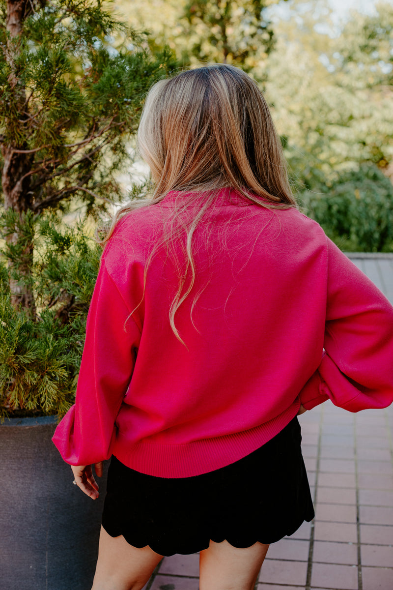 queen of sparkles: pink cardigan with candy cane and bow